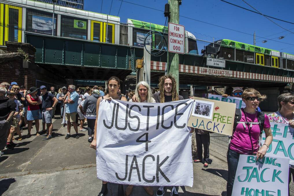 Jack Aston's daughter Meg, wife Wendy and son Ben with protesters late last year. Picture: Meredith O'Shea
