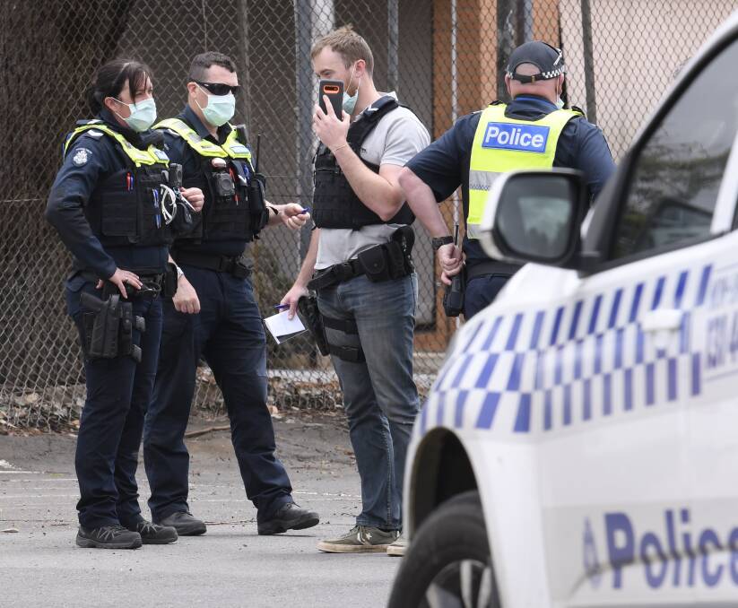 Police on the scene. Picture: Lachlan Bence