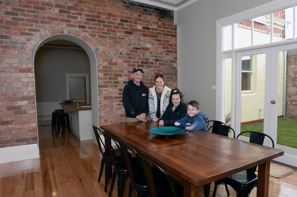 Luke, Aliesha, Lilly, 13, and Jim, 10, Antonio have transformed 71 Victoria Street back to its former glory. Picture: KATE HEALY