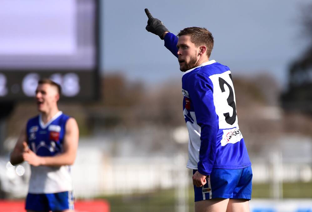 THAT'S GOING THROUGH: Austin Murphy scores one of his four goals in the grand final. That took his season tally to 51 majors. Picture: Adam Trafford.