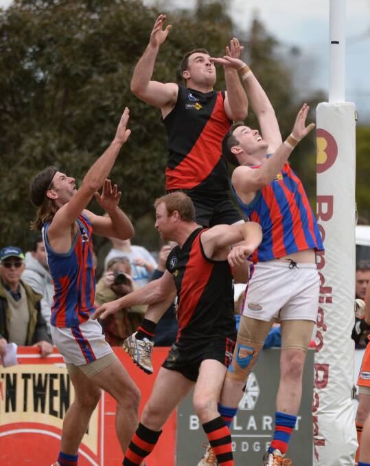 HIGH FLYER: Glen Phelps, pictured in the 2013 grand final loss to Hepburn, is set to return from a hamstring injury this weekend. Picture: Adam Trafford.