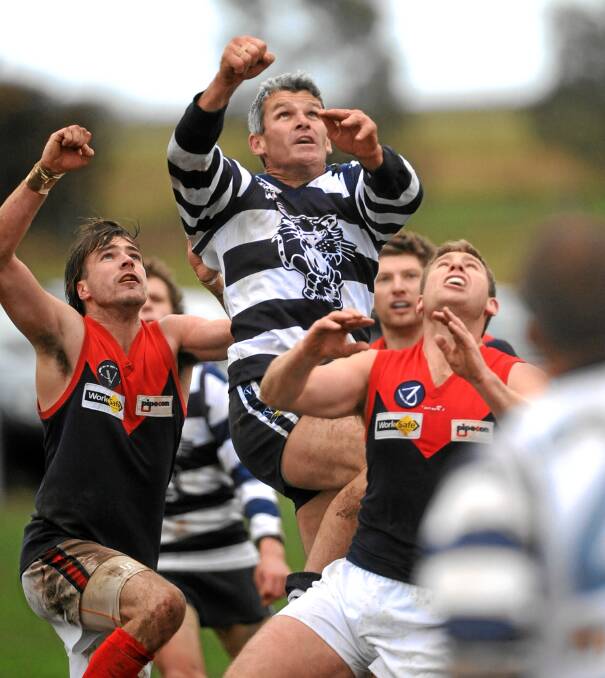LEAP: Shaun Smith is pictured playing with Newlyn in the Central Highlands Football League.