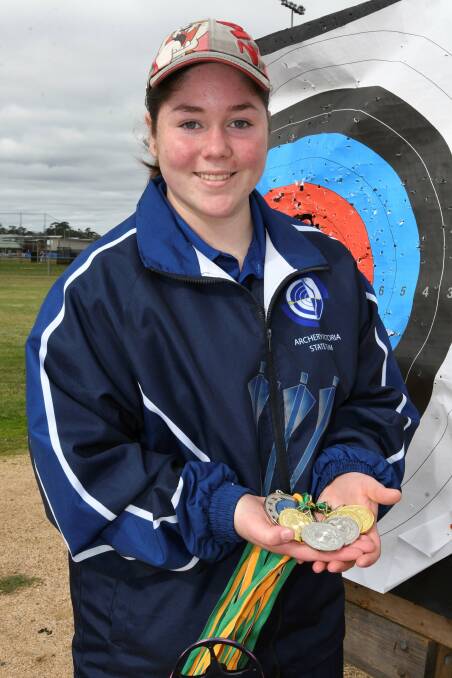 GOLDEN GIRL: Tazmin Forrest collected plenty of medals at the Archery Australia Youth National Championships and will now compete in an oceania championships event in July. Picture: Lachlan Bence.