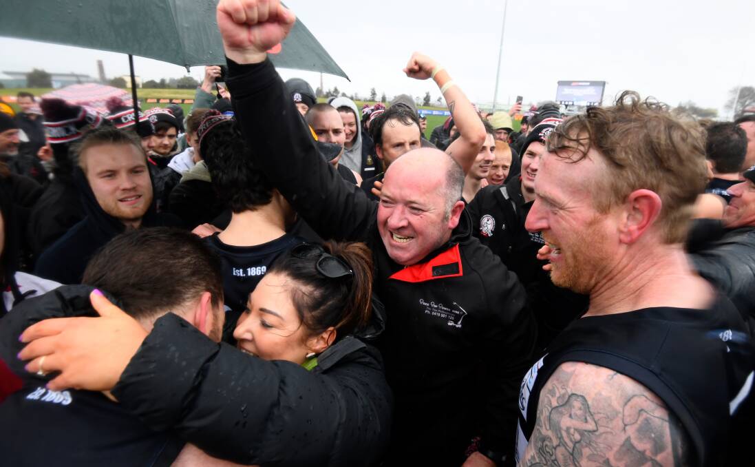 JUBILATION: Creswick president Mick Alsop celebrates after the final siren on Saturday. The Wickers beat Springbank by 11 points to win the reserves flag.