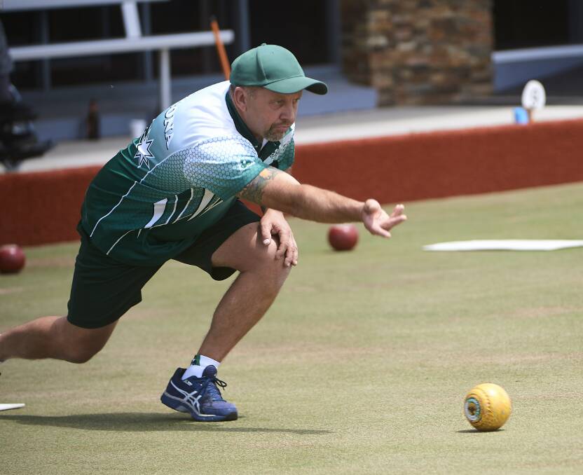 NICE STYLE: Webbcona player Chris Steenhuis rolls one down during Saturday's Geelong-Ballarat Premier Bowls clash against Sebastopol. Picture: Luka Kauzlaric.