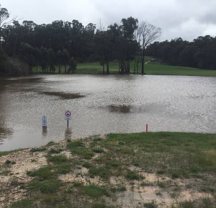 THE BIG WET: A photo showing a full dam on the 15th hole at the RACV Goldfields Resort at Creswick, which was closed for a day during the middle of last week.