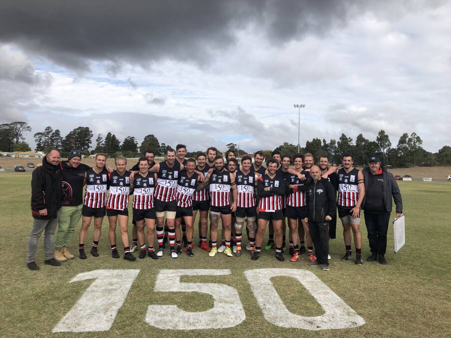 Creswick players and support staff after the win on Saturday. The club is celebrating its 150th anniversary in 2019.
