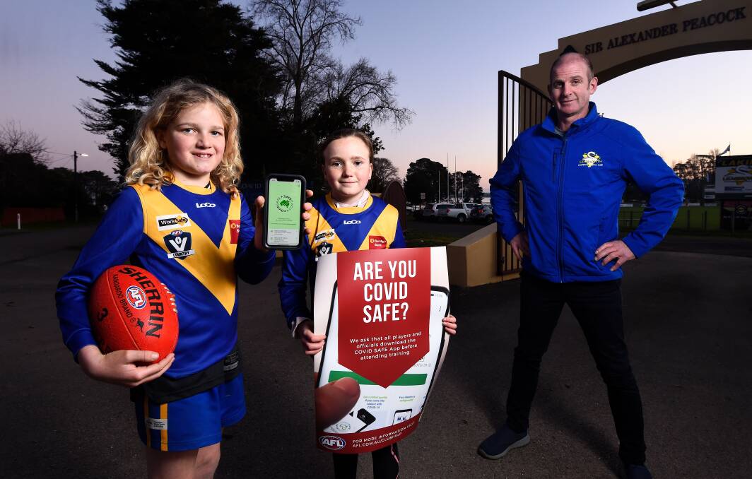 ALL SET: Learmonth Football Netball Club president Steve Griffin (right) with junior players Remmy and Jarvis. Picture: Adam Trafford.