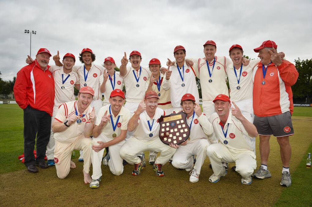 CHAMPIONS: Wendouree players and supporters celebrate the club's first grade premiership last season.