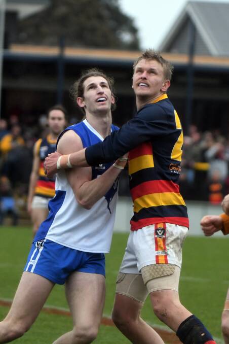 BIG MEN: Waubra's Geordie Lukich and Beaufort's Josh McDermott had a great battle in the ruck. Lukich was one of the Roos' best players in the game.