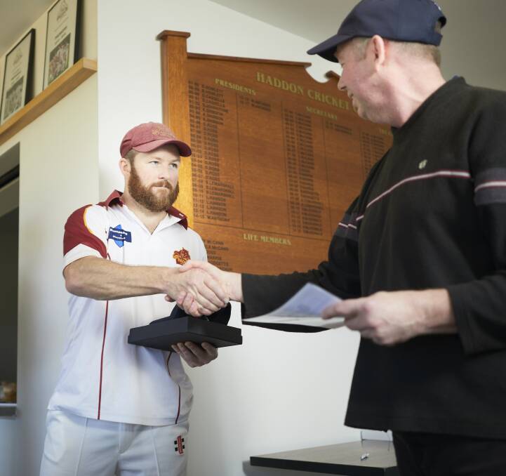 HONOUR: Shaun McArthur is presented with a plaque for his place in the Victorian Country Cricket League team of the season. Picture: Luka Kauzlaric.
