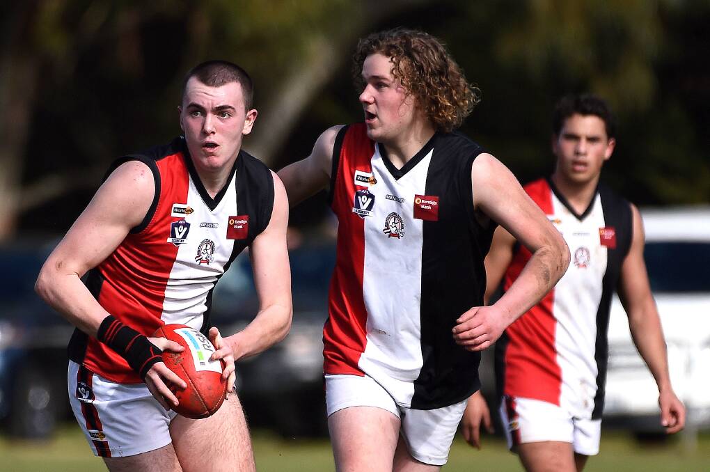 JUNIOR FOOTY: Joshua Dunne of Creswick is pictured with the ball during a round of under-18 football in July. Picture: Adam Trafford.