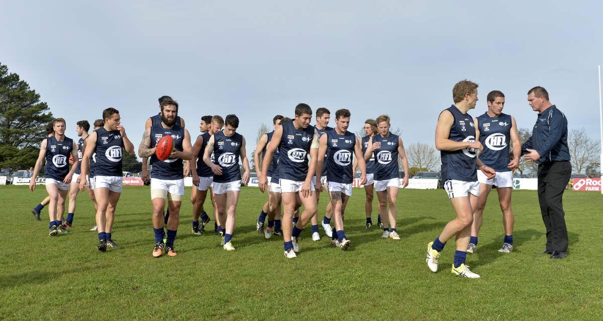 IN CHARGE: CHFL coach Clive Raak (right) with his players. Picture: Dylan Burns.