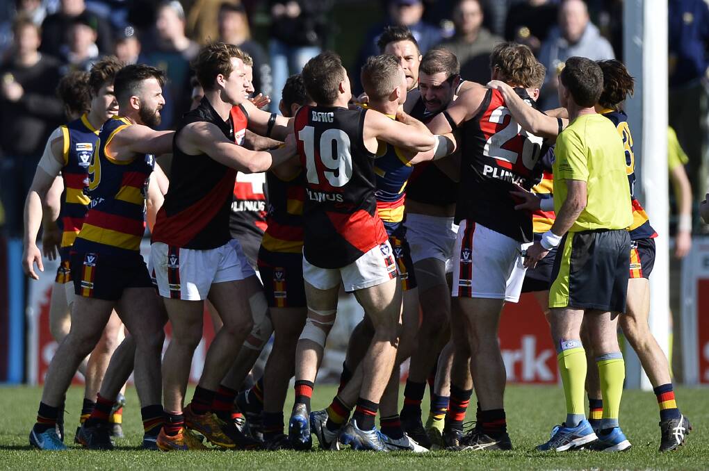 HEATED: Beaufort and Buninyong players get involved in a scuffle during a fiery moment of Saturday's senior grand final.
