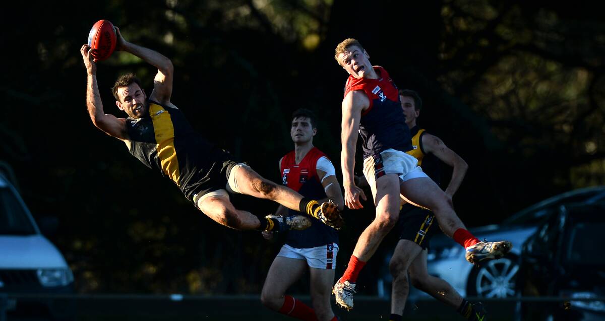 BRILLIANT BEST: Paul McMahon flies during the only clash between Springbank and Bungaree this year. Picture: Adam Trafford.