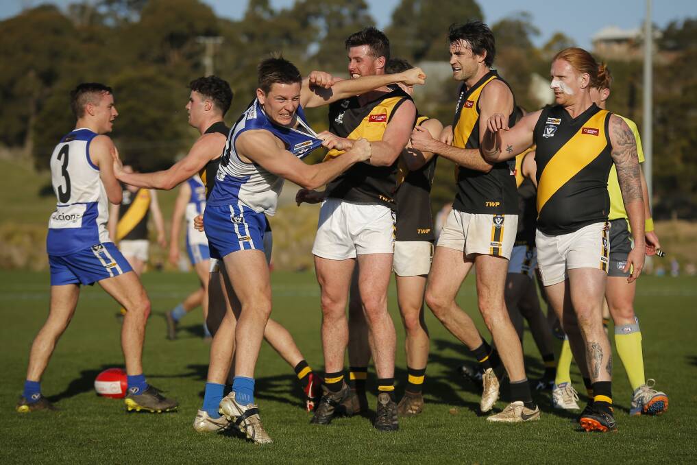 HEATED: Waubra and Springbank players engage in some push and shove during the semi final showdown at Buninyong.