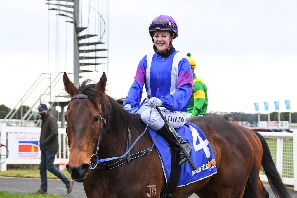 ALL SMILES: Tayla Childs returns to scale aboard Ronay, which secured her fifth career winner. Picture: Racing Photos.