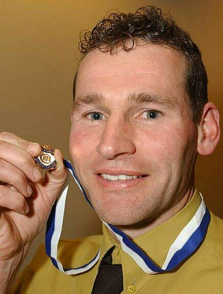 LONG TIME AGO: Ballan's Simon Wilkie with his medal in 2002.