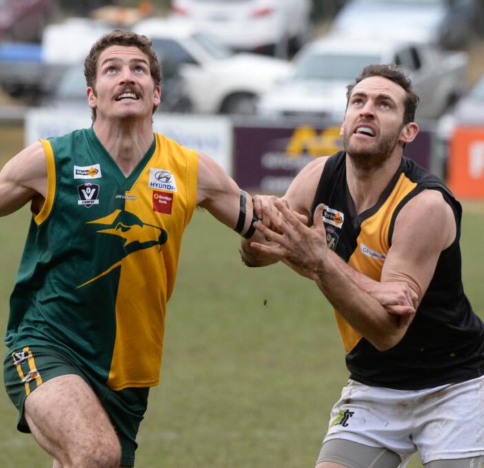 STAR PERFORMER: Springbank forward Paul McMahon (right) and Gordon's Luke Gunnell jostle for position on Saturday. McMahon was named best on ground for his nine-goal effort. Picture: Kate Healy. Story: John McGregor.