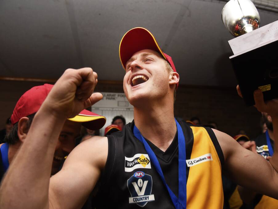 HOW SWEET IT IS: Couch is all smiles in the rooms after his side beat Buninyong by 29 points to claim the premiership.