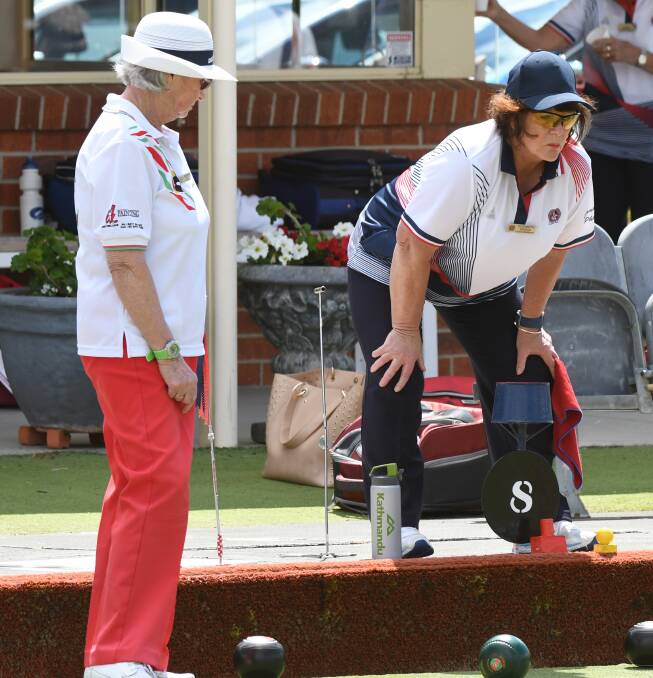 FOCUSED: Daylesford's Maureen Tate and Central Wendouree's Elizabeth Kierce keep an eye on proceedings on Monday. Picture: Kate Healy.