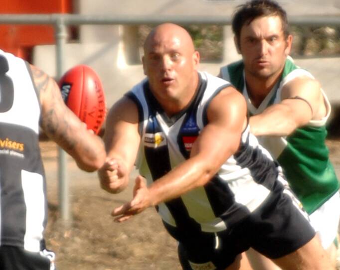 Rick Andrews, pictured playing for Clunes in 2012, is coach of the team.