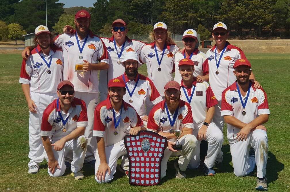 PREMIERS: The Haddon side celebrates its division one premiership success on Saturday. The team proved far too good for Lexton, winning by eight wickets.