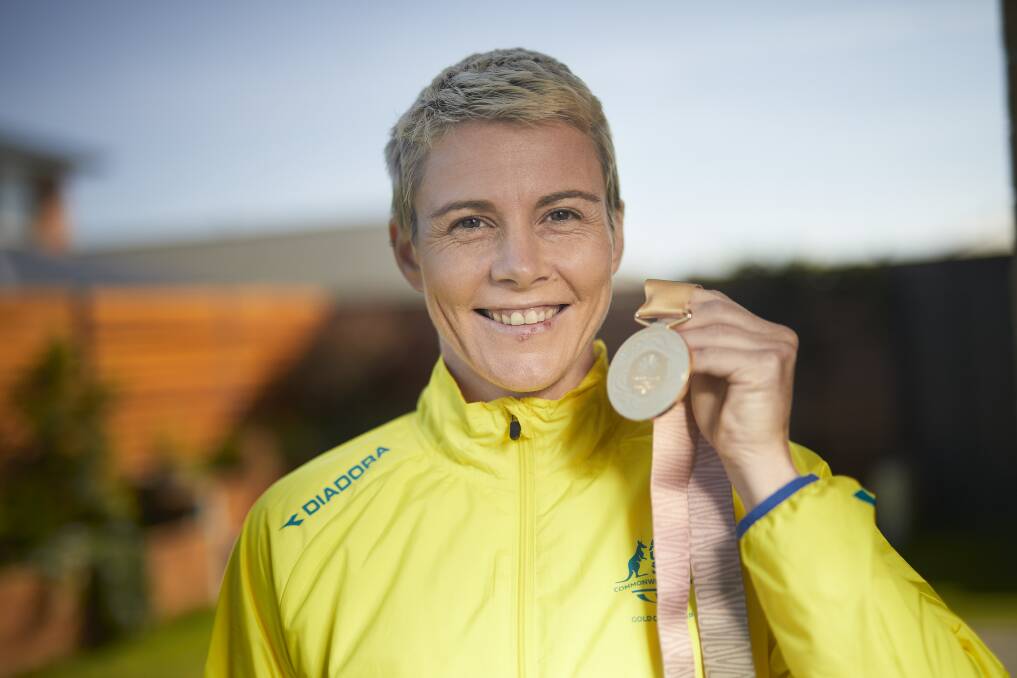 GOLD: Kathryn Mitchell won the women's javelin at the Commonwealth Games last year.