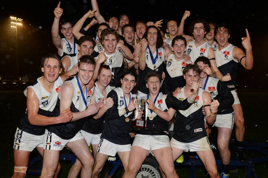 CHAMPS: North Ballarat City under-17 players after the grand final win last year.