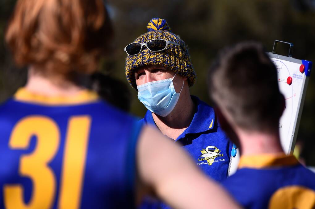 FACE COVERING: Learmonth under-15 coach Jim Hare sports a mask during Saturday's game. Picture: Adam Trafford.
