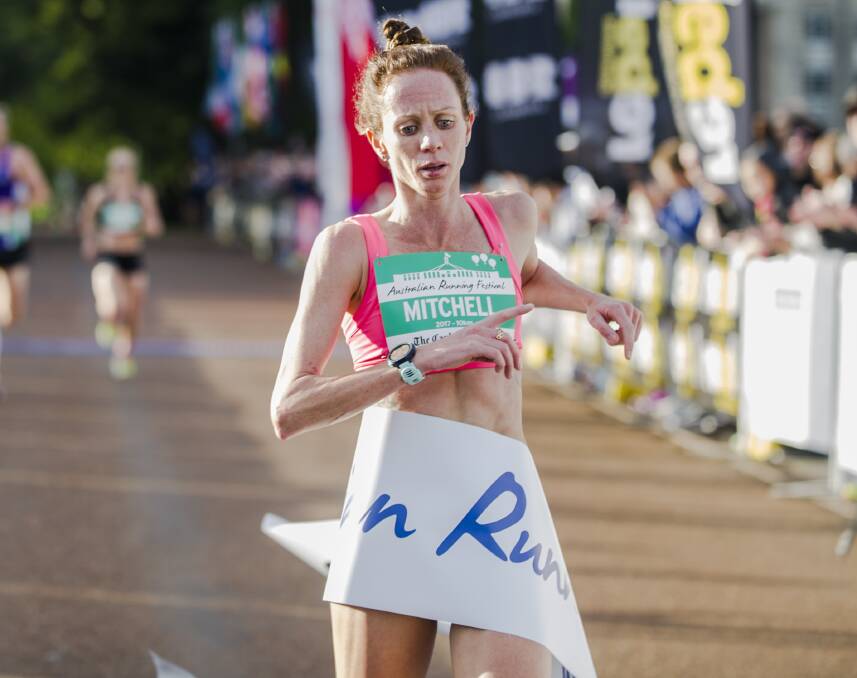 STATEMENT: Former Eureka runner Victoria Mitchell, pictured winning in Canberra, says the race record prize in Albury is sexist. Mitchell broke the women's course record last weekend without reward.Photo: Jamila Toderas