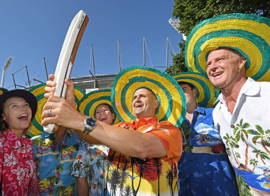 The Commonwealth Games Queen's Baton is introduced to spectators at the fourth Ashes Test between Australia and England at Melbourne Cricket Ground on Tuesday.
Picture: AAP