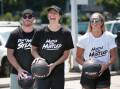 PLAY TIME: Former AFL player Adam Cooney with basketballers Jenna O'Hea and Rebecca Cole at the launch of a new three-on-three national league early this year. Picture: David Crosling