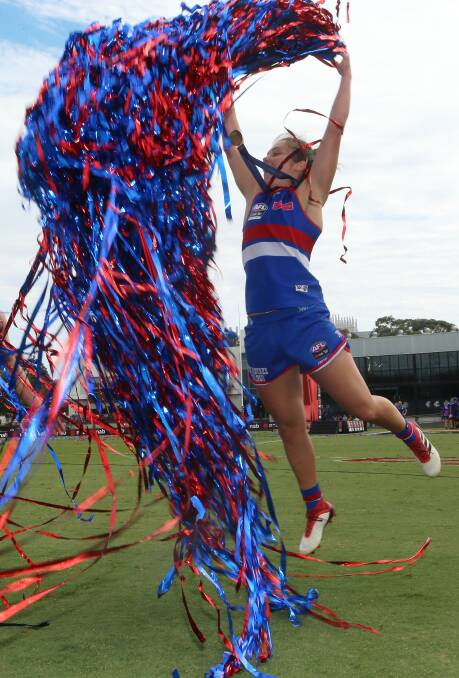 CELEBRATE: Western Bulldogs AFLW premiership captain Ellie Blackburn is set to play state league at Mars Stadium on Sunday. We must support such matches in a bid to attract top level games. Picture: Hamish Blair, AAP 