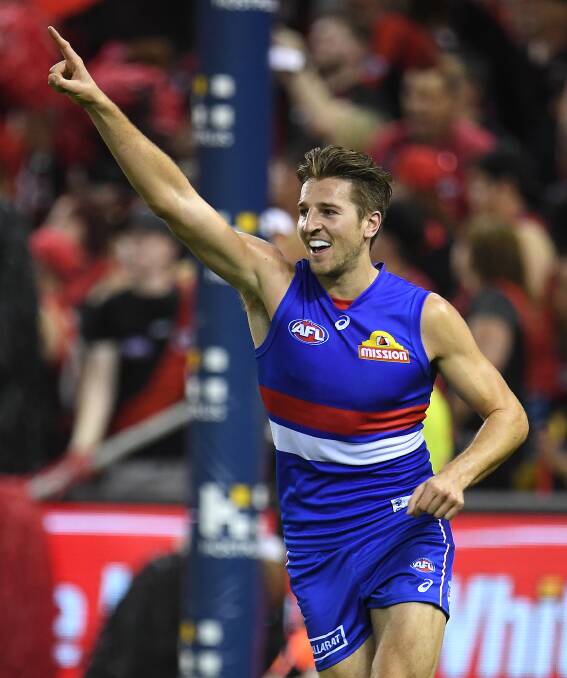 FIRED UP: Western Bulldogs are yet to win an AFL premiership season game in Ballarat. Star midfielder Marcus Bontempelli will spearhead the club's determined bid to change that. Picture: Julian Smith, AAP