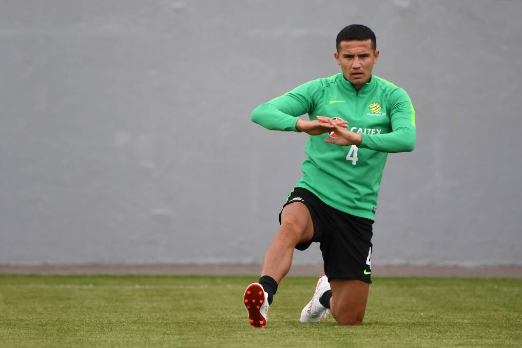 INSPIRATION: Socceroo Tim Cahill is stretching ahead of a chance to become the fourth player in history to score in a World Cup. Picture: Dean Lewins, AAP