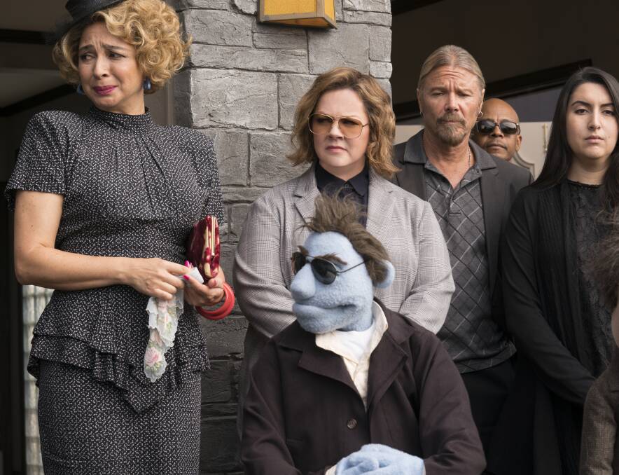 SCENE: Humour is what you would expect from Melissa McCarthy (centre) in a scene from The Happytime Murders. Picture: Hopper Stone, STX Entertainment via AP