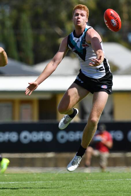 TAKING THE LEAP: Willem Drew impressed for Port Adelaide in the JLT Series. He will play his first AFL game on Sunday. Picture: AAP