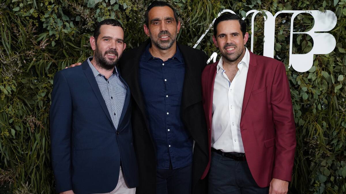 FAMILY: Adam Goodes flanked by brothers Jake and Brett on the red carpet for the premiere of The Australian Dream, documenting Adam's career and the controversial reactions that marred the last few years of his football. Picture: AAP