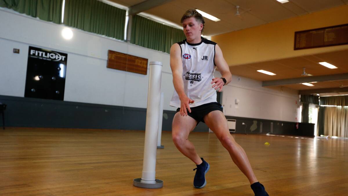 Outstanding: Warrnambool College Jay Rantall prepares for the AFL Draft Combine at his school gym. Picture: Mark Witte