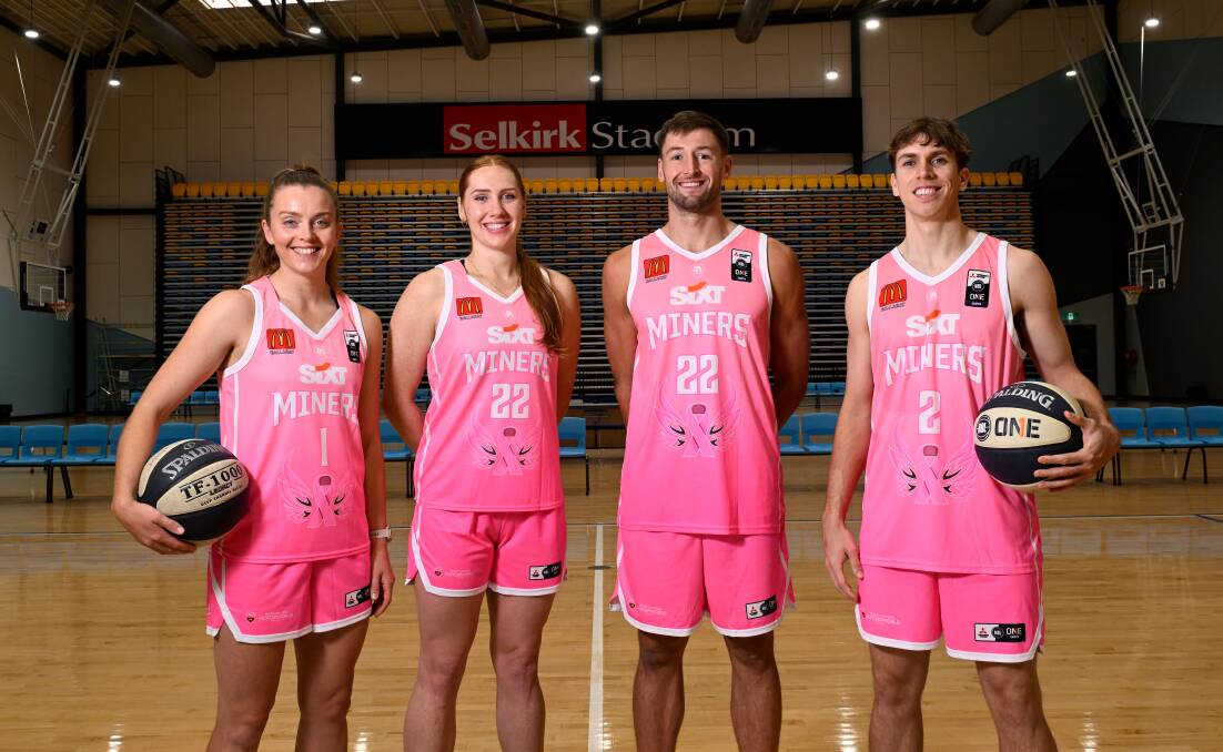 Abbey Wehrung, Chloe Bibby, Tyler Rudolph and Nick Stoddart of the Miners model the new pink kit. Picture by Adam Trafford