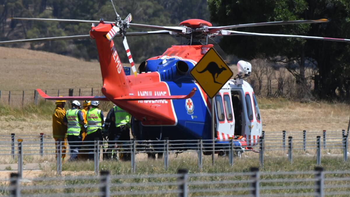 The Air Ambulance arrives to transport another crash victim to hospital. Picture: Kate Healy