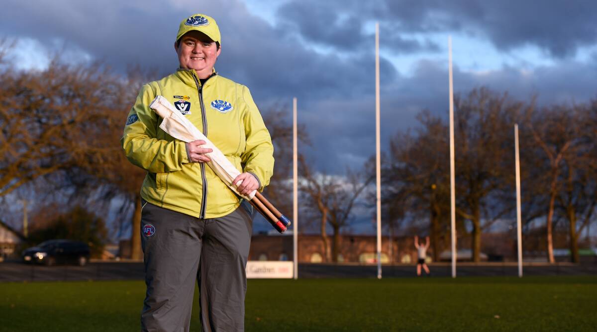 FLAG-BEARER: Suzanne Olsen is preparing to umpire her 800th match this weekend. Picture: Adam Trafford