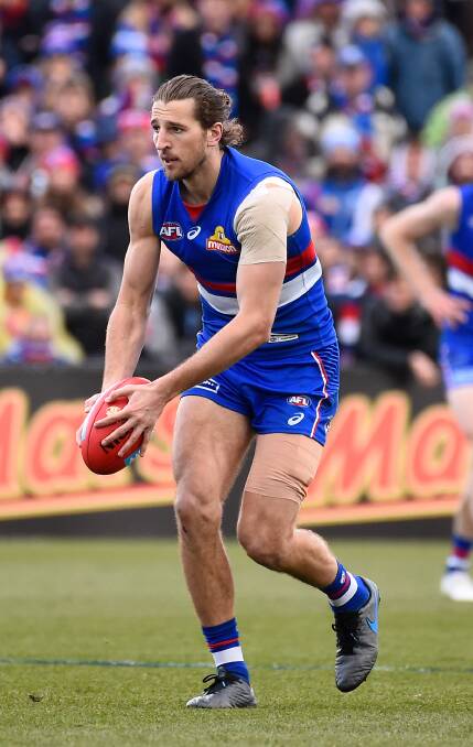 TOP DOGS: The Western Bulldogs are on top of the AFL and Marcus Bontempelli will lead his side in Ballarat against the Brisbane Lions on Saturday. 