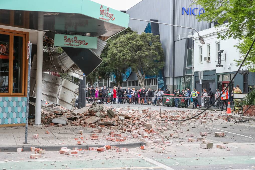 CRASH LANDING: Some of the damage in Melbourne after Wednesday morning's earthquake. Picture: Getty Images