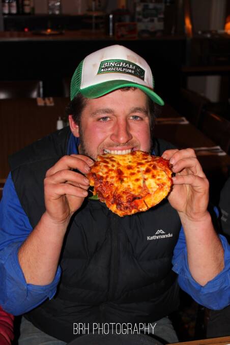Callum Murray chows down on a parma. Picture: BRH Photography