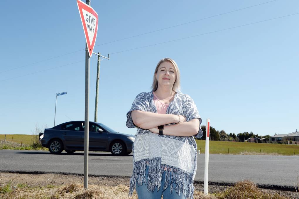 Jo-anne Simon fears someone will be killed at the intersection at Cherry Flat Road and Bells Road if something isn't done to fix it. Picture: Kate Healy