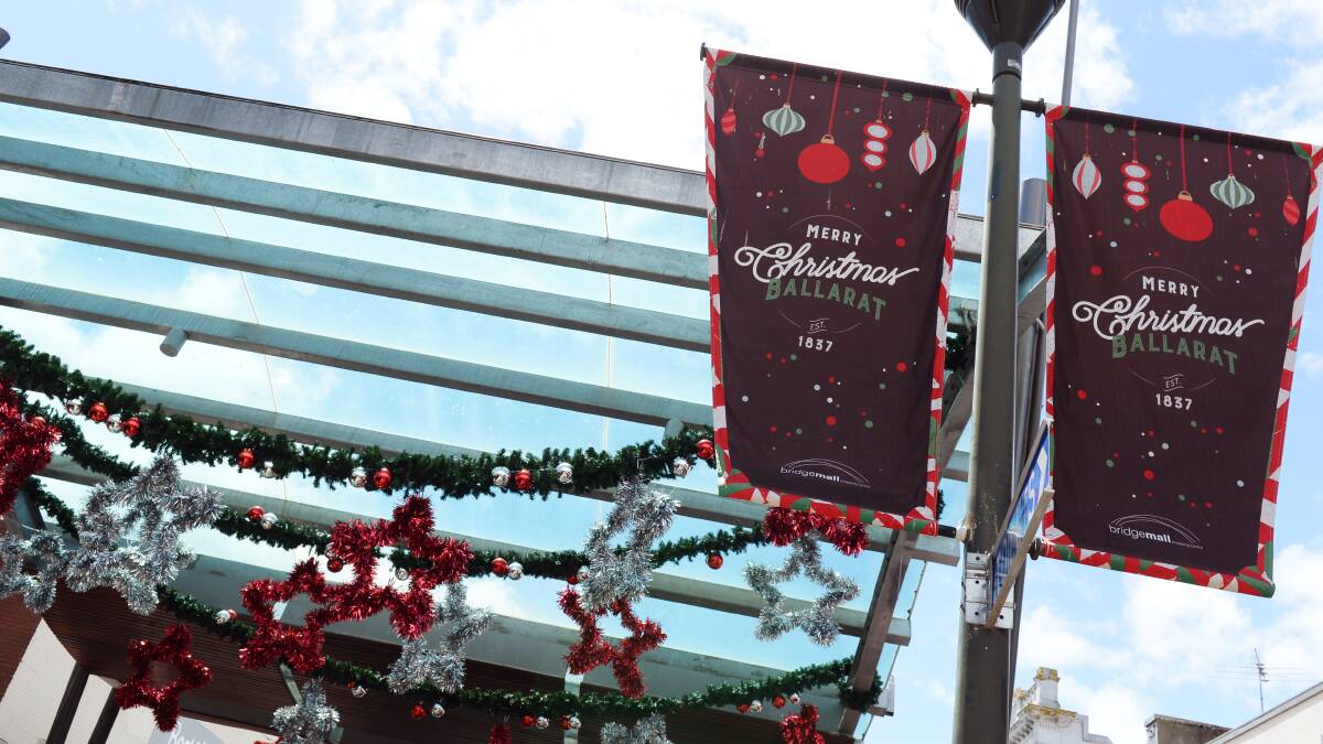 Decorations adorned much of the Bridge Mall as people packed into the shopping centre for last minute Christmas shopping on Saturday. Picture: Kate Healy