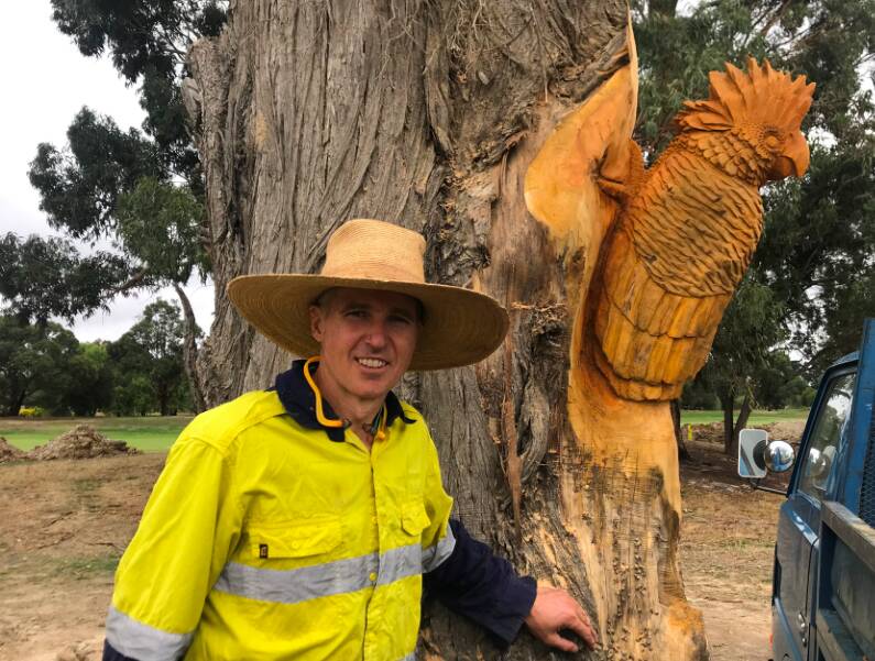 NEW LIFE:Artist Linton Torr with one of the new sculpture works at the Drew's Paddock Estate. Picture: supplied
