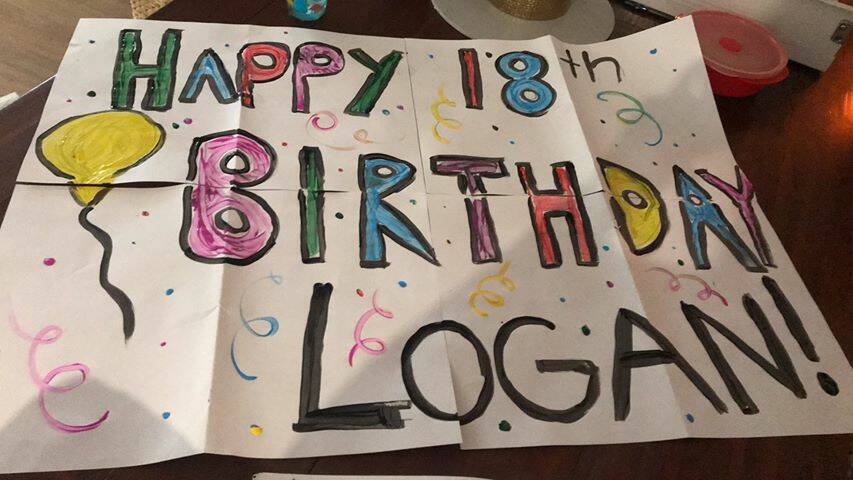 Relative and friends all around Ballarat made signs wishing Logan a happy 18th birthday.